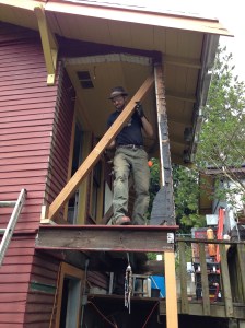 Morgan working on demolition of back porch