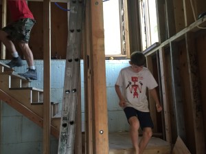 Morgan and Huck running up and down in celebration.